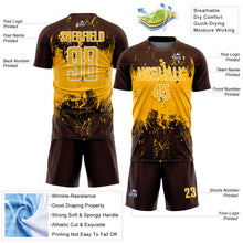Laden Sie das Bild in den Galerie-Viewer, Custom Brown Gold-White Abstract Splatter Grunge Art Sports Sublimation Soccer Uniform Jersey
