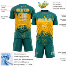 Laden Sie das Bild in den Galerie-Viewer, Custom Teal Gold-White Abstract Splatter Grunge Art Sports Sublimation Soccer Uniform Jersey
