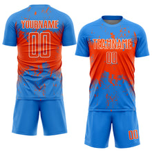 Laden Sie das Bild in den Galerie-Viewer, Custom Powder Blue Orange-White Abstract Splatter Grunge Art Sports Sublimation Soccer Uniform Jersey
