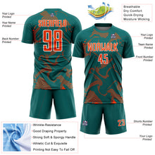 Laden Sie das Bild in den Galerie-Viewer, Custom Teal Orange-White Curve Lines Sports Sublimation Soccer Uniform Jersey
