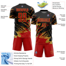 Load image into Gallery viewer, Custom Black Red-Old Gold Abstract Fragment Art Splash Sports Sublimation Soccer Uniform Jersey
