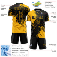 Load image into Gallery viewer, Custom Black Gold Abstract Brush Stroke Sports Sublimation Soccer Uniform Jersey
