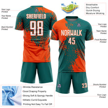 Laden Sie das Bild in den Galerie-Viewer, Custom Teal White-Orange Abstract Brush Stroke Sports Sublimation Soccer Uniform Jersey
