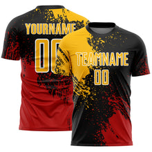 Load image into Gallery viewer, Custom Black Gold Red-White Abstract Brush Stroke Sports Sublimation Soccer Uniform Jersey
