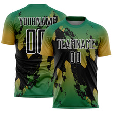 Laden Sie das Bild in den Galerie-Viewer, Custom Kelly Green Black Old Gold-White Gradient Splash Sublimation Soccer Uniform Jersey

