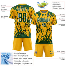 Laden Sie das Bild in den Galerie-Viewer, Custom Gold Green-White Splatter Torn Sharp Brush Stroke Sublimation Soccer Uniform Jersey
