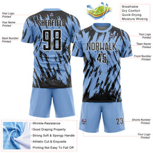 Laden Sie das Bild in den Galerie-Viewer, Custom Light Blue Black-White Splatter Torn Sharp Brush Stroke Sublimation Soccer Uniform Jersey
