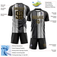 Laden Sie das Bild in den Galerie-Viewer, Custom Black White-Old Gold Brush Stroke Fluid Stripes Sublimation Soccer Uniform Jersey
