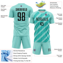 Laden Sie das Bild in den Galerie-Viewer, Custom Ice Blue Black-Aqua Diagonal Stripes Sublimation Soccer Uniform Jersey
