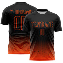 Laden Sie das Bild in den Galerie-Viewer, Custom Black-Orange Fade Wave Lines Splatter Sublimation Soccer Uniform Jersey

