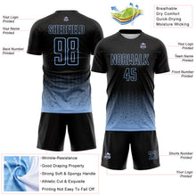 Laden Sie das Bild in den Galerie-Viewer, Custom Black-Light Blue Fade Wave Lines Splatter Sublimation Soccer Uniform Jersey
