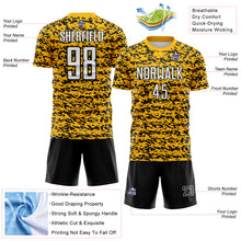 Laden Sie das Bild in den Galerie-Viewer, Custom Gold White-Black Geometric Fragment Splatter Sublimation Soccer Uniform Jersey
