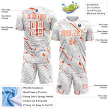 Laden Sie das Bild in den Galerie-Viewer, Custom White Orange-Gray Brush Stroke Slashes And Dot Grid Sublimation Soccer Uniform Jersey
