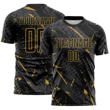 Laden Sie das Bild in den Galerie-Viewer, Custom Black Old Gold-Gray Brush Stroke Slashes And Dot Grid Sublimation Soccer Uniform Jersey
