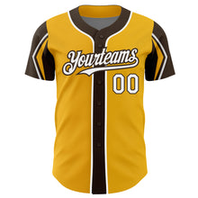 Load image into Gallery viewer, Custom Gold White-Brown 3 Colors Arm Shapes Authentic Baseball Jersey
