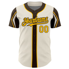Laden Sie das Bild in den Galerie-Viewer, Custom Cream Gold-Brown 3 Colors Arm Shapes Authentic Baseball Jersey
