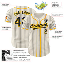 Laden Sie das Bild in den Galerie-Viewer, Custom Cream Black Pinstripe Gold Authentic Baseball Jersey

