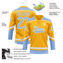 Laden Sie das Bild in den Galerie-Viewer, Custom Gold White-Light Blue Hockey Lace Neck Jersey
