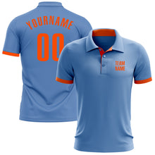 Laden Sie das Bild in den Galerie-Viewer, Custom Light Blue Orange Performance Golf Polo Shirt
