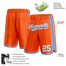 Laden Sie das Bild in den Galerie-Viewer, Custom Orange White-Light Blue Authentic Basketball Shorts
