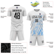 Laden Sie das Bild in den Galerie-Viewer, Custom White Black-Light Blue Sublimation Soccer Uniform Jersey
