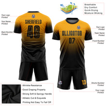 Laden Sie das Bild in den Galerie-Viewer, Custom Gold Black Sublimation Fade Fashion Soccer Uniform Jersey
